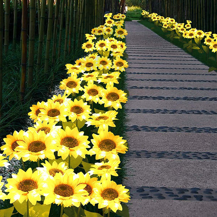 Vandtæt solblomst lampe til udendørs brug, gult lys, soldrevet, IP65 vejrbestandighed.