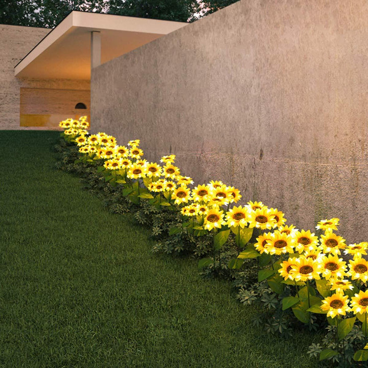 Vandtæt solblomst lampe til udendørs brug, gult lys, soldrevet, IP65 vejrbestandighed.