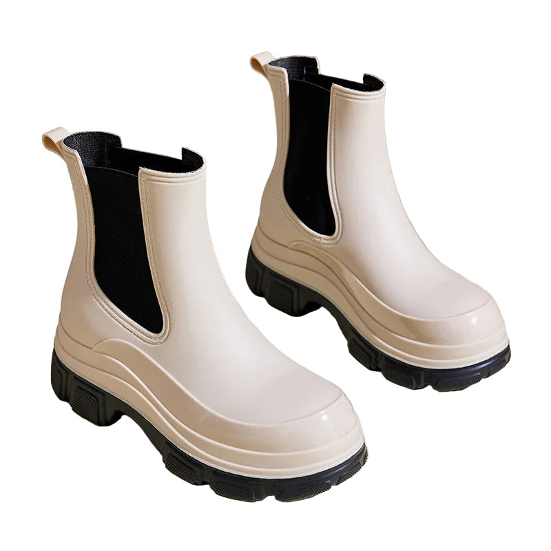 Vedenpitävät naisten Chelsea-saappaat, tummat, slip-resistant chunky-pohjalla, tyylikäs ja käytännöllinen valinta.