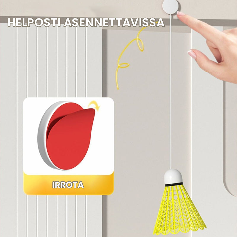 Vihreä automaattinen sulkapalloharjoittelija, joka simuloi aidosti lentorataa ja helpottaa taitojen kehittämistä yksin.