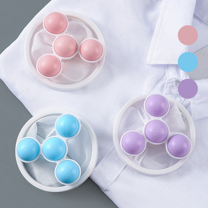 Farverige polymer vaskemaskine fnugfiltre i lilla, blå og pink holder tøjet fnugfrit.