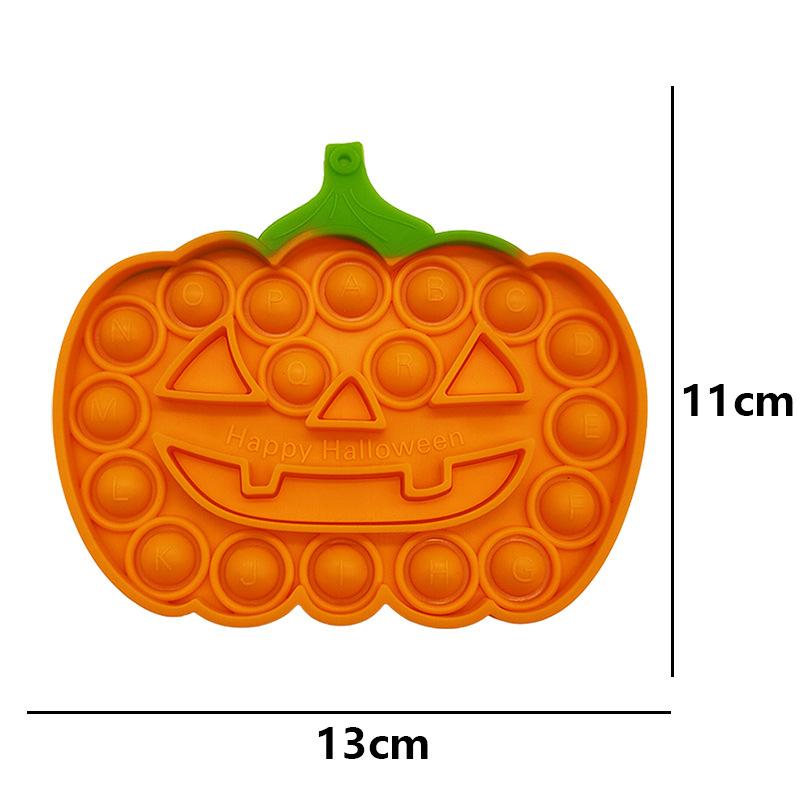 Farverigt Halloween Pop-it legetøj til børn, med orange, grønne og lyserøde bobler til at trykke.