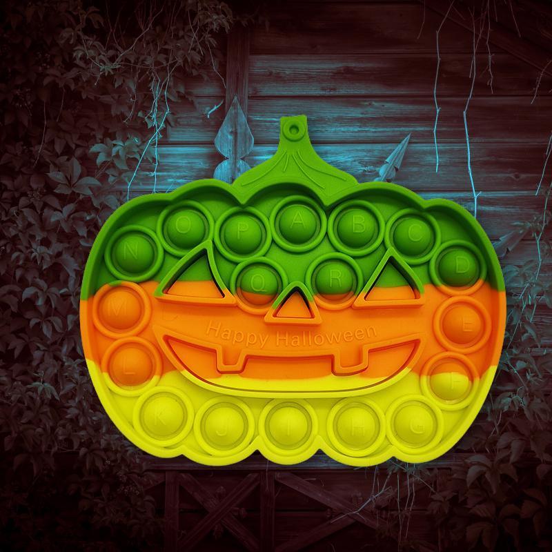 Farverigt Halloween Pop-it legetøj til børn, med orange, grønne og lyserøde bobler til at trykke.