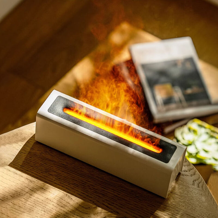 Farverig LED aroma diffusor med 7-farvet flamme LED-lys, skaber en fredfyldt hjemmeatmosfære. Alsidig ultralyds enhed.