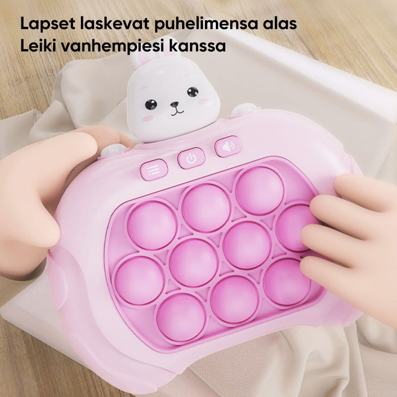 Farverigt elektronisk boblespil til børn med sjove symboler og en fantasifuld baggrund, der udvikler øje-hånd-koordination.