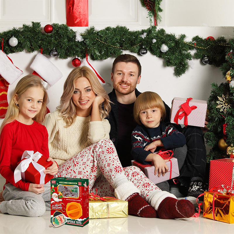 Farverig jule-tema æggelegetøjsmaskine til børn, inklusive plastikdele og opmuntrer til kreativ leg.