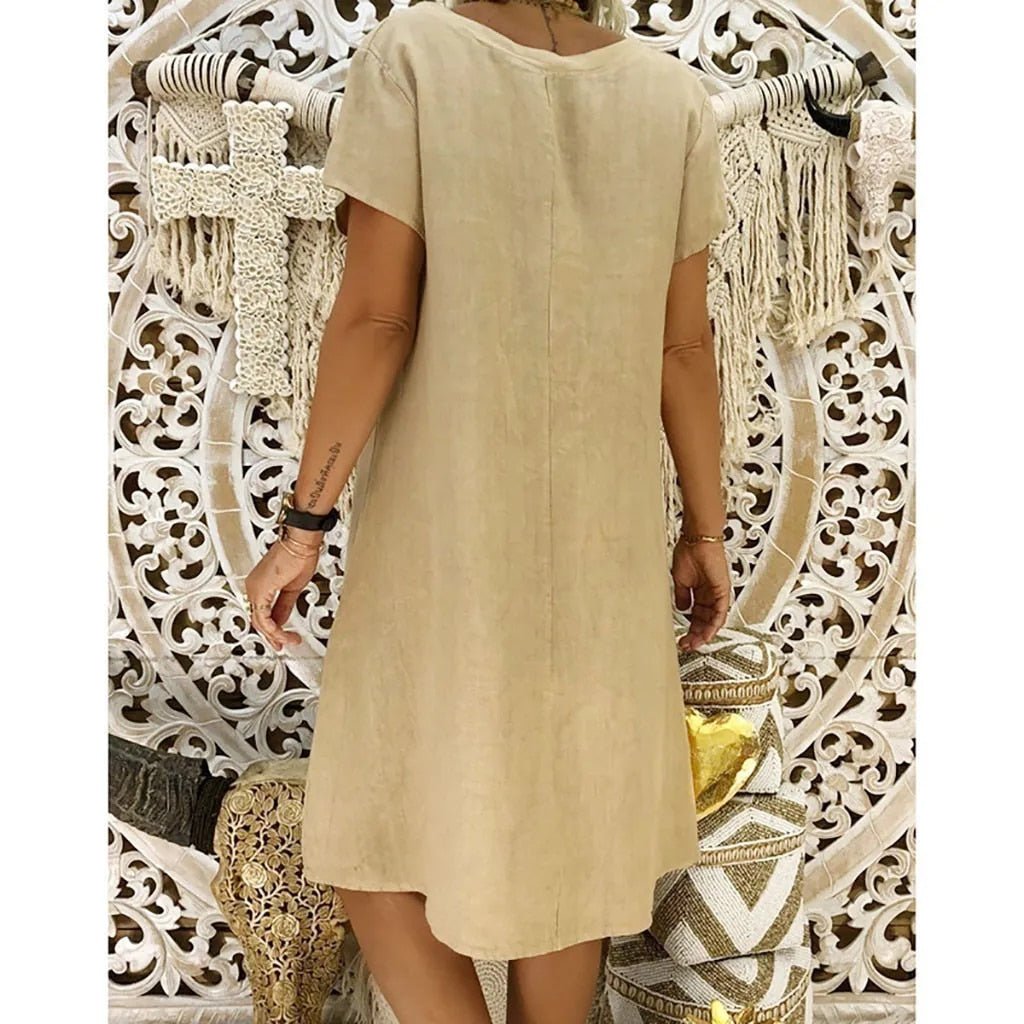 Elegant dame A-line kjole med V-hals og korte ærmer, perfekt som casual sommerkjole eller festkjole.