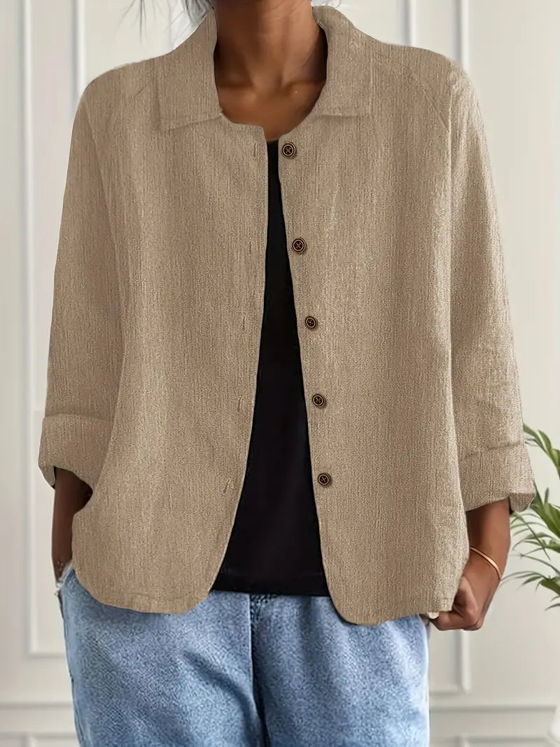 Komfortabel damejakke med knapper, ensfarvet og afslappet stil. Perfekt til overtøj.