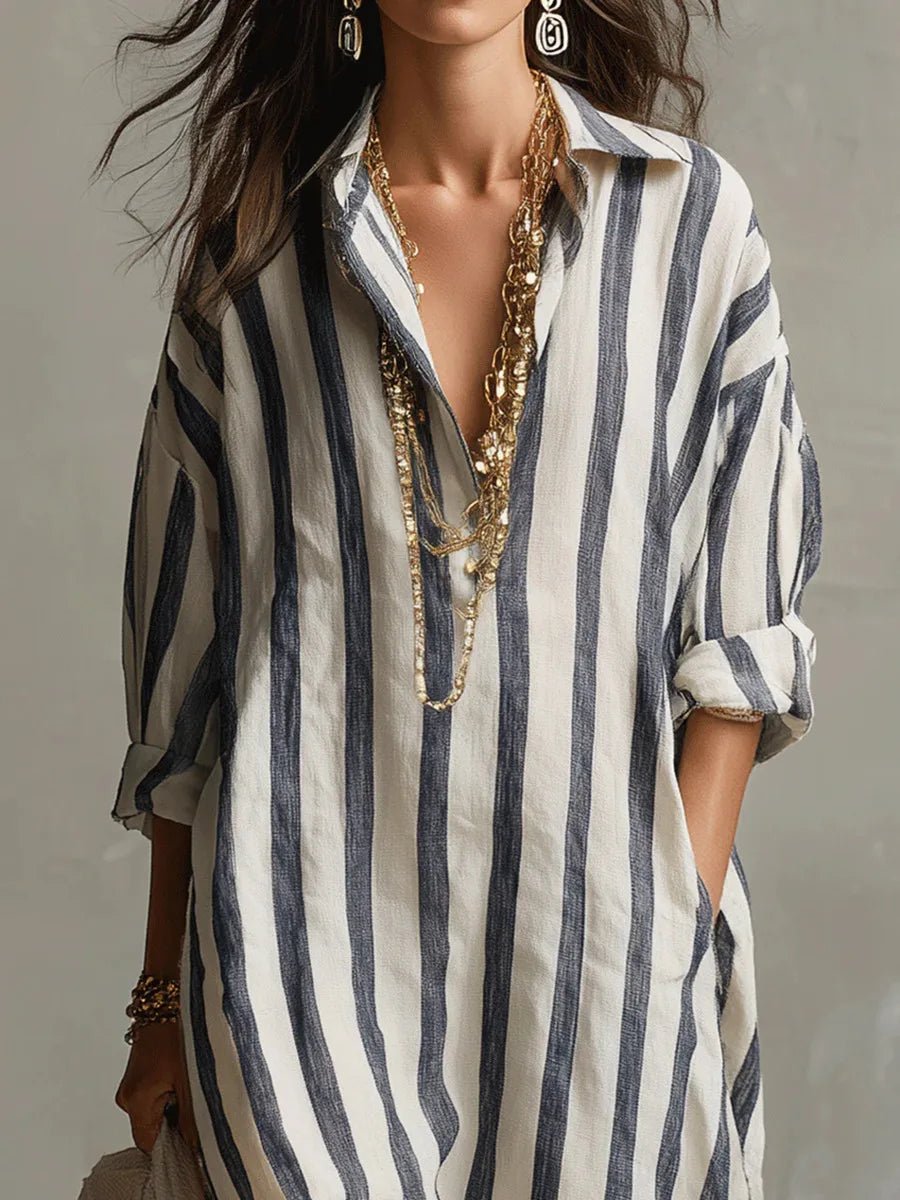 Elegant stribet linned maxikjole til damer med oversized pasform. Perfekt som afslappet sommerkjole.