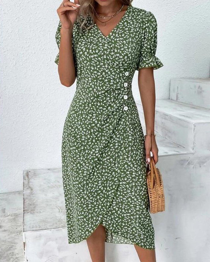 Blomstret dame midi wrap kjole med V-udskæring og korte ærmer, perfekt som sommer- eller festkjole.