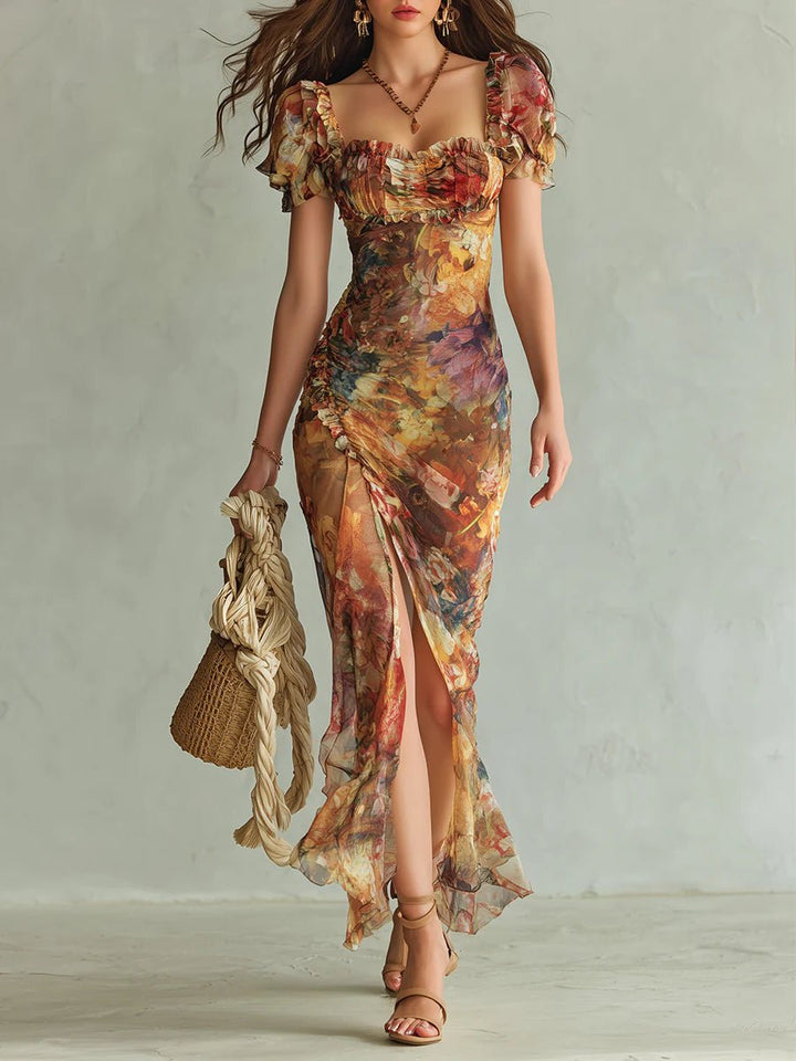 Boheme orange blomstret maxikjole til damer med sweetheart hals. Perfekt sommer- eller festkjole.