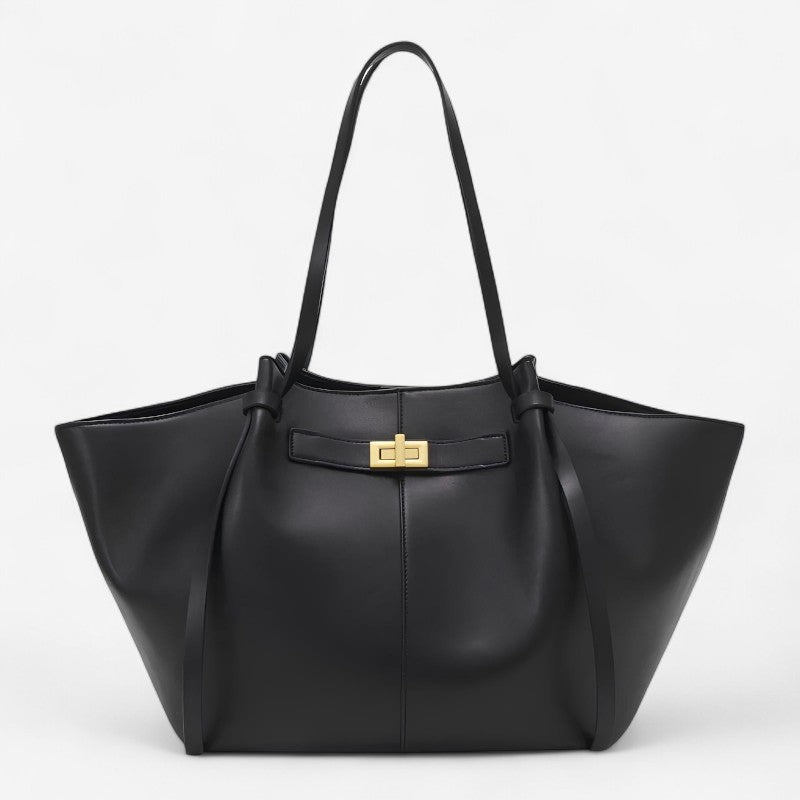 Sort klassisk tote taske med lynlås og rummeligt design. Ideel som skuldertaske og hverdagstaske til damer.
