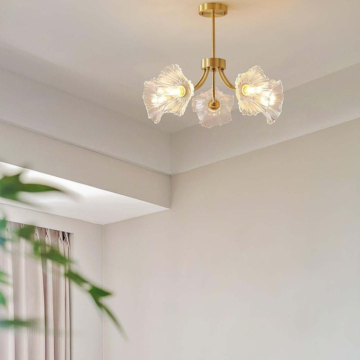Glasblomsterkrone med messing og klar finish