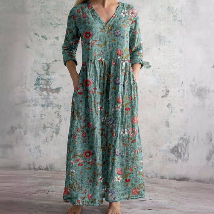 Farverig V-hals blomsterprint sommer maxikjole til kvinder. Feminin og afslappet damekjole.