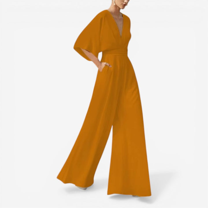 Alsidig damejumpsuit med v-hals og løs pasform, elegant og casual stil for forår.