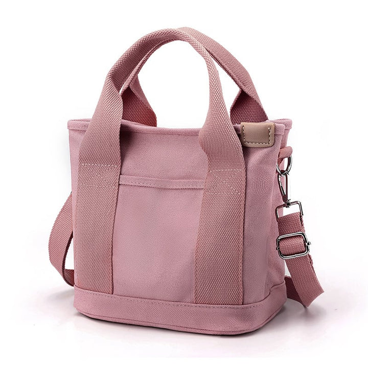 Elegant dame crossbody taske i kompakt design. Robust lynlås og praktiske rum gør den perfekt til farten.