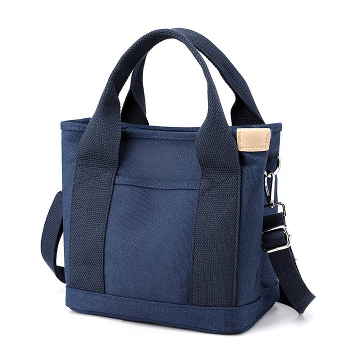 Moderne lille crossbody taske til kvinder. Optimal til at holde personlige ejendele sikre og lettilgængelige.