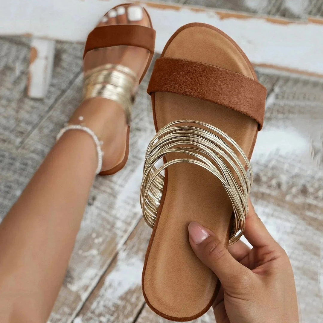 Lette slip-on dame sandaler med suveræn fodstøtte. Ortopædiske kvindesandaler designet for daglig komfort.