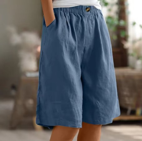 Detalje af elastisk talje på dame shorts for fleksibilitet og komfort hele dagen.