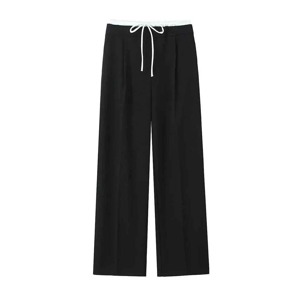 Komfortable wide leg bukser til kvinder; polyester blanding sikrer løs pasform og behagelig oplevelse.