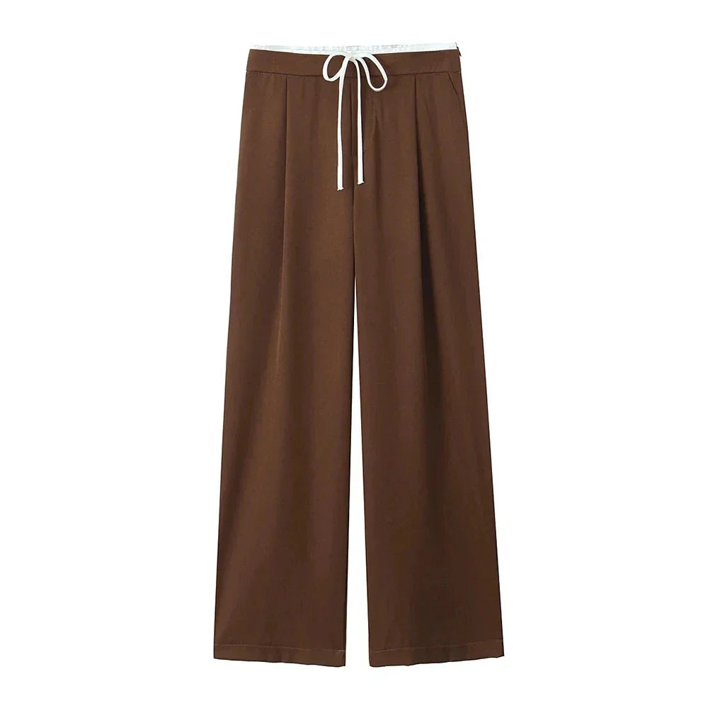 Elegante dame bukser med brede ben; ideel til en afslappet, men stilfuld hverdagslook.