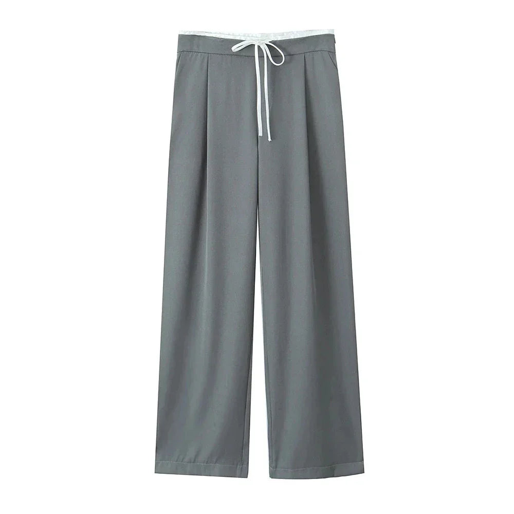Stilfulde dame bukser i wide leg design; polyester blanding for komfort og elegant hverdagsstil.