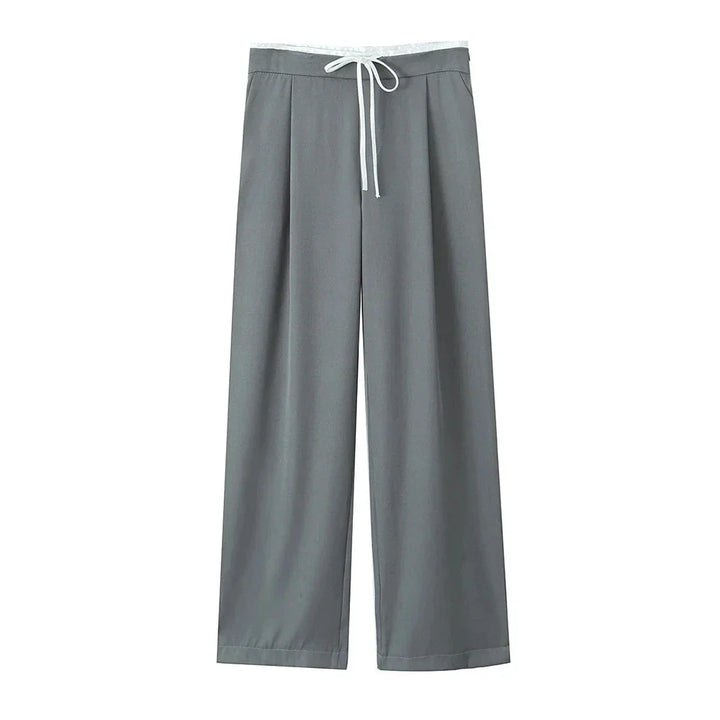 Stilfulde dame bukser i wide leg design; polyester blanding for komfort og elegant hverdagsstil.