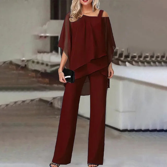 Dame elegant 2-delt sæt med skulderfri design, ideelt som festtøj. Moderne og formelt buksesæt til kvinder.