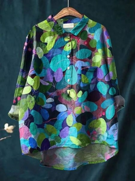 Tidløs langærmet bluse i blomstret design, passer til enhver garderobe.