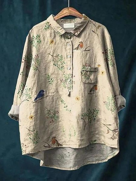 Klassisk langærmet kvindebluse med blomsterprint, alsidig til alle lejligheder.