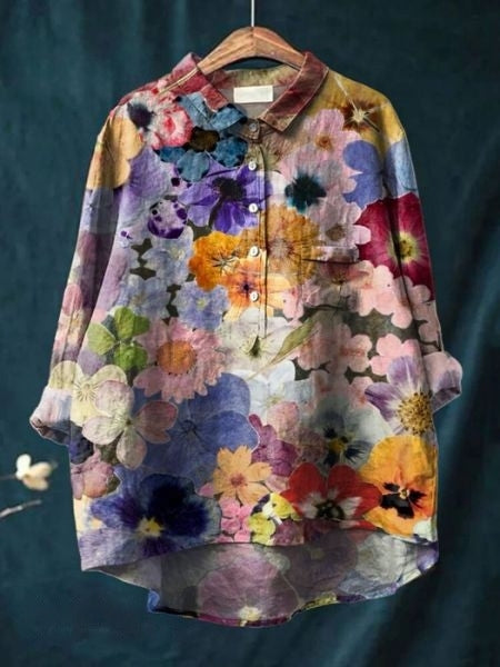 Komfortabel plus size kvindebluse med smukt blomstermønster, nem at style.