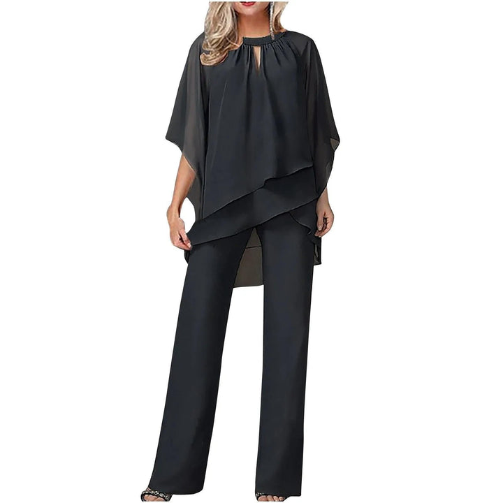 Elegant gallatøj: Dame dragtsæt i blød chiffon med asymmetrisk snit. Perfekt til festligheder og bryllupsgæster.