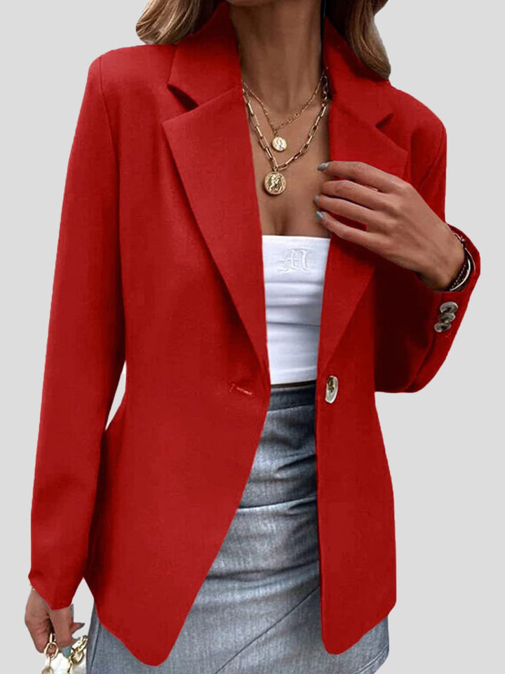 Elegant dameblazer med enkel revers. Perfekt til kontoret og stilfulde begivenheder.