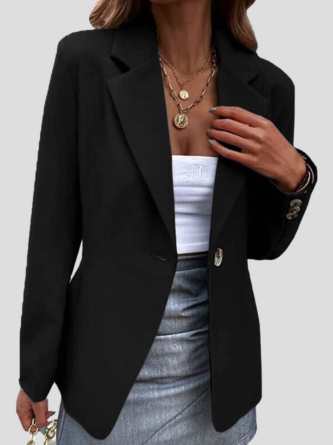 Alsidig enkeltknap blazer til kvinder. Ideel til både hverdag og fest, fremhæver modebevidsthed.
