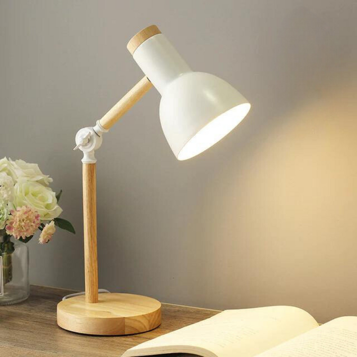 Stilfuld foldbar bordlampe med blødt, indirekte LED lys. Perfekt til boligindretning og hyggelige stunder derhjemme.