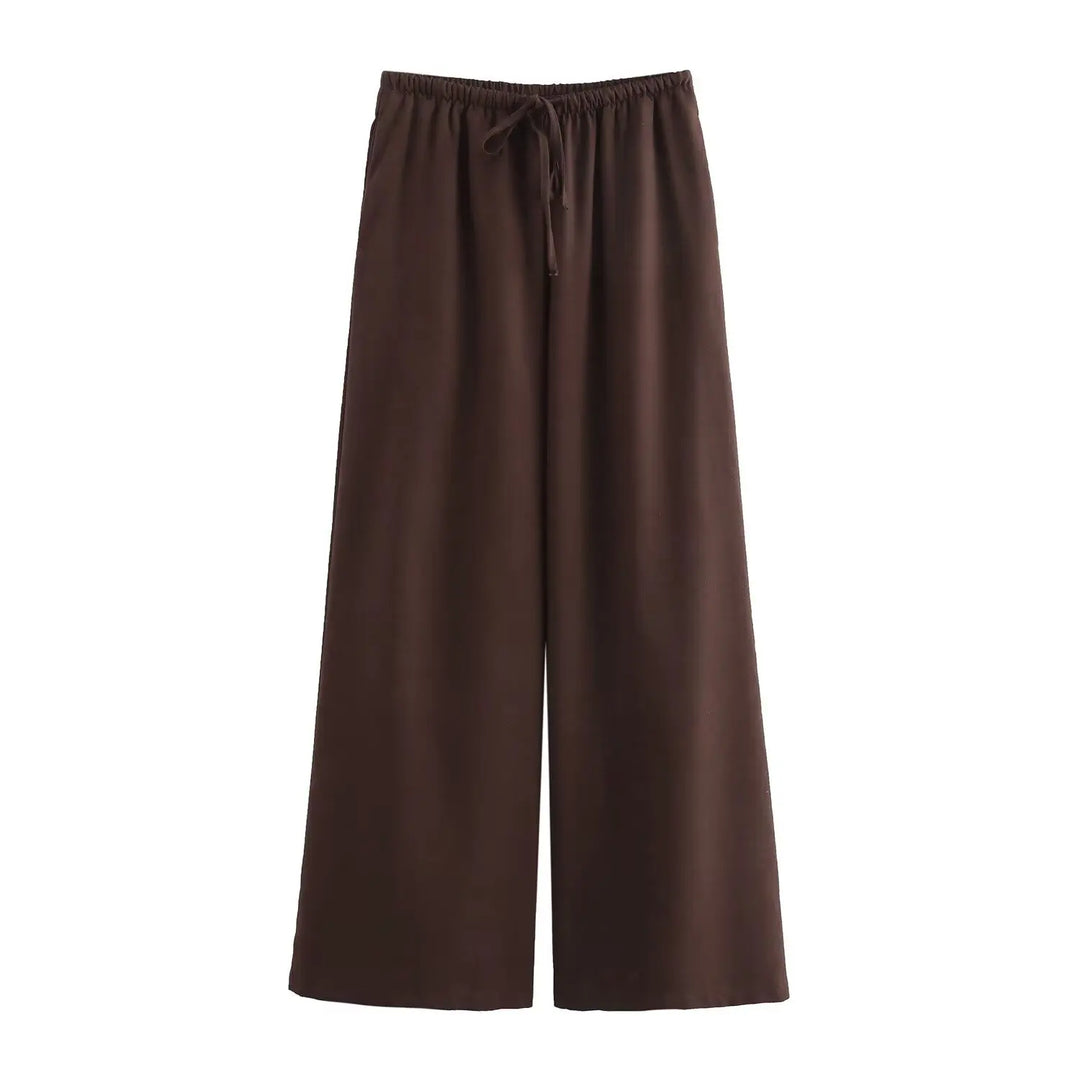 Elegant pantsuit-inspireret sæt med vide ben og løs pasform, til den modebevidste kvinde.