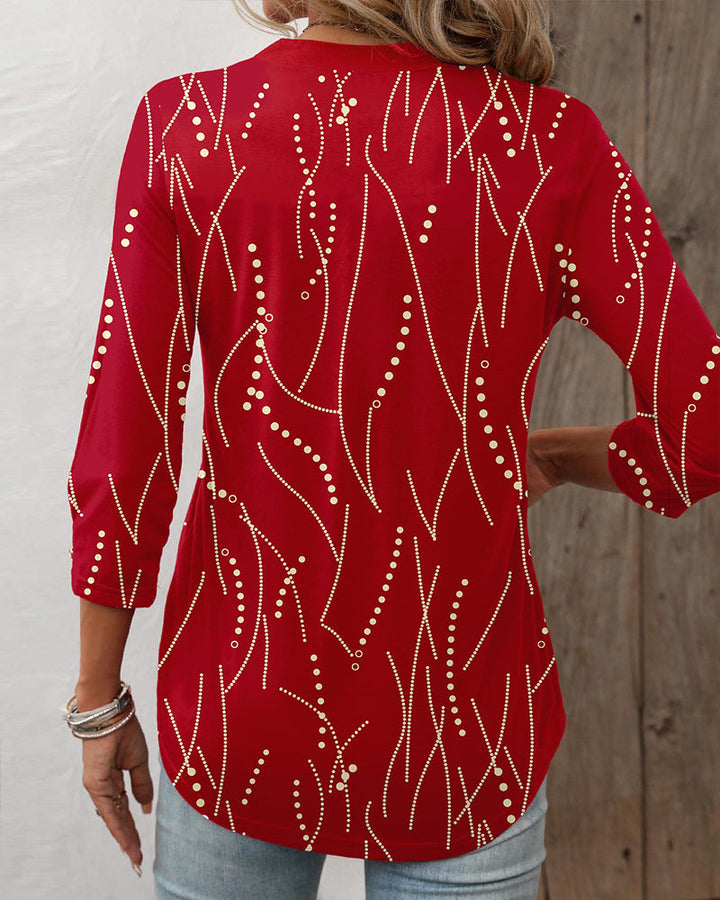 Stilfuld damebluse med V-udskæring, knapper og elegant design, ideel til modebevidste kvinder.