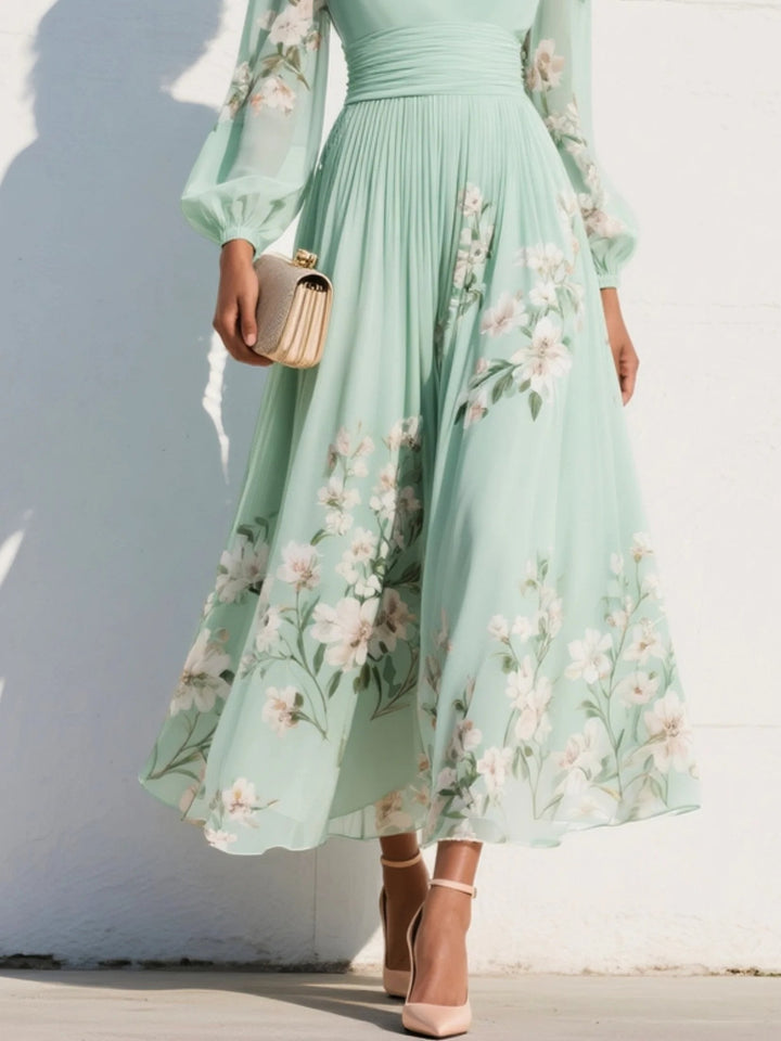 Smuk dame blomster midi-kjole med V-hals og ballonærmer. Festkjole med plisseret skørt, ideel til sommer.
