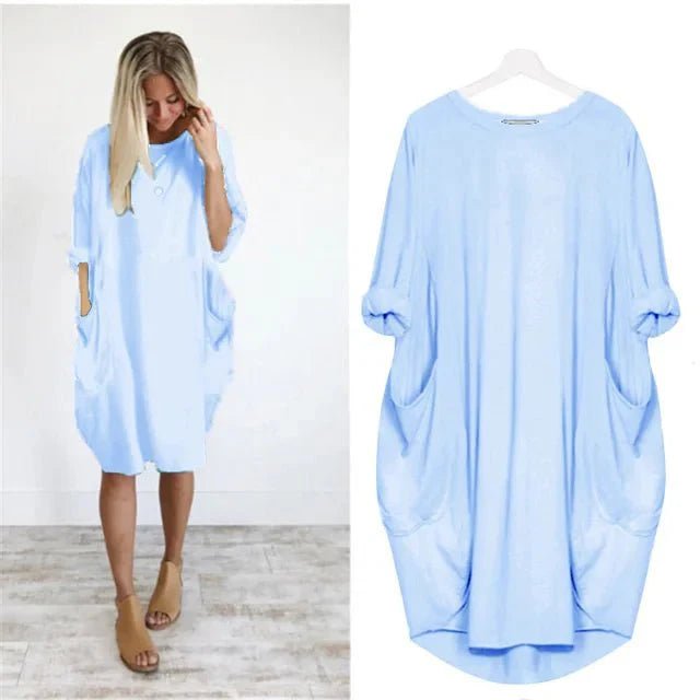 Plus size damekjole med løs pasform, trekvart ærmer og rund hals. Komfortabel til store størrelser.