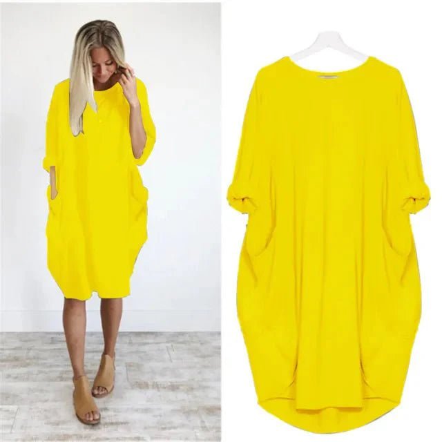 Elegant plus size hverdagskjole med lommer. Kan bruges som sommerkjole og festkjole for kvinder.