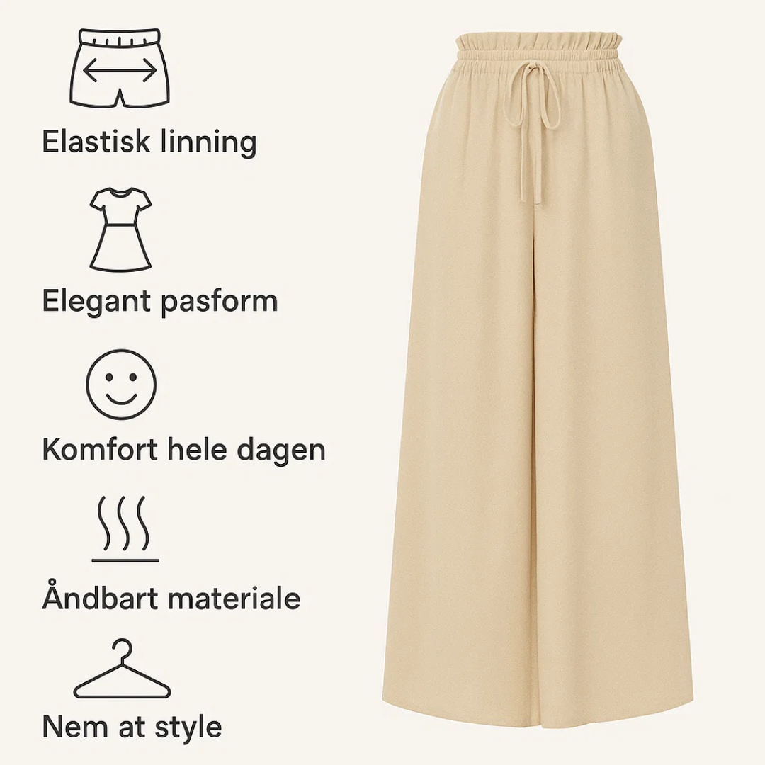 Klassiske løse kvindebukser med elastik i taljen, både elegante & komfortable.