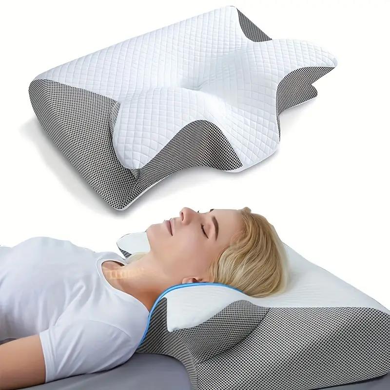 Sommerfuglepude i memoryskum mod nakkesmerter. Ergonomisk støtte giver bedre søvn og aflastning af nakken.