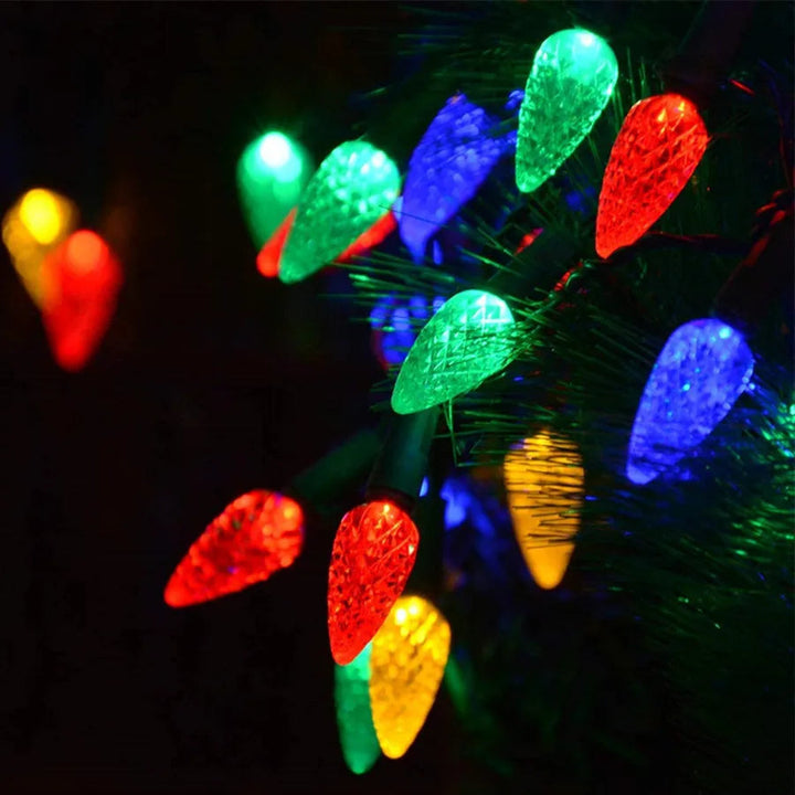 Flerfarvet solcelledrevet julegirlande med LED-lys til udendørs/indendørs brug, 8 indstillinger for festlig julestemning.