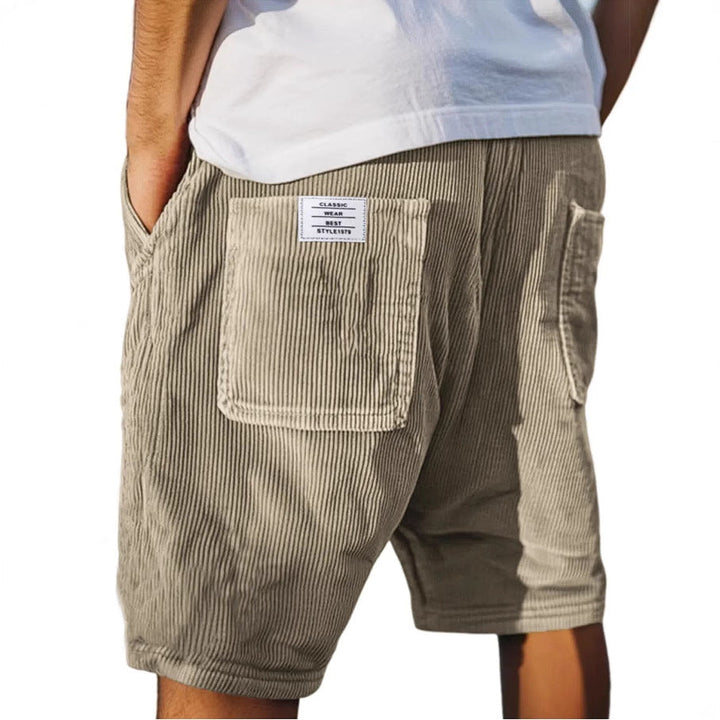 Khaki herreshorts: Komfortabelt design med elastisk talje og dybe lommer. Ideel til en urban og afslappet sommer.