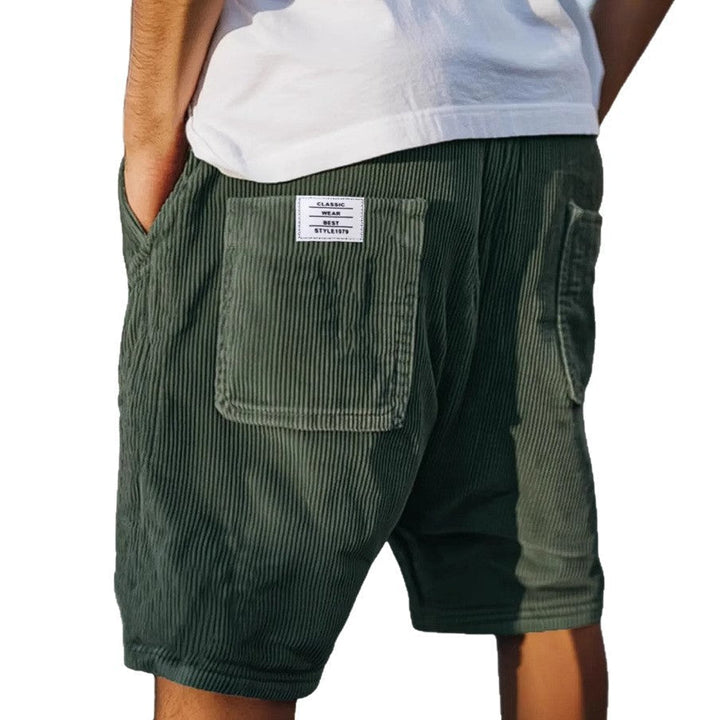 Herre shorts i grå med elastisk talje. Suveræn komfort og urban stil, inkl. lommer, perfekt til sommeraktiviteter.