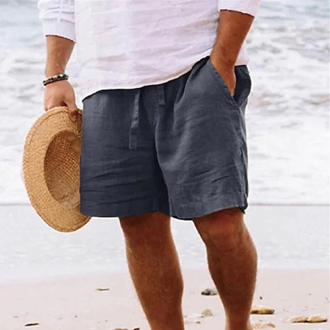 Behagelige herre sommershorts i linned med snørebånd, ideelle til strand og afslapning.
