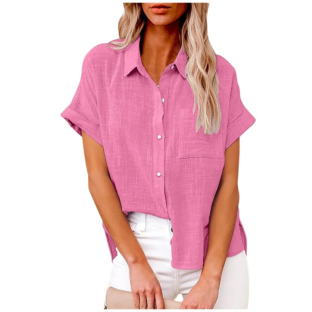 Pink dame sommerbluse i letvægtsstof. Løs pasform og korte ærmer for stilfuld hverdag.
