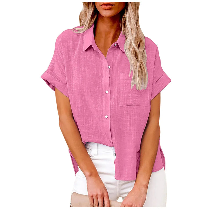 Pink dame sommerbluse i letvægtsstof. Løs pasform og korte ærmer for stilfuld hverdag.