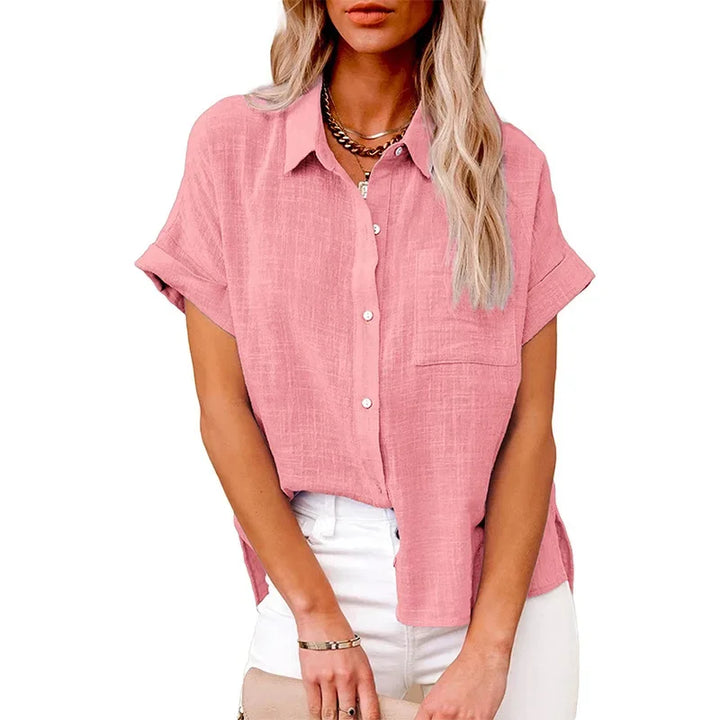 Grøn damebluse med løs pasform og korte ærmer. Komfortabel sommerbluse til kvinder.