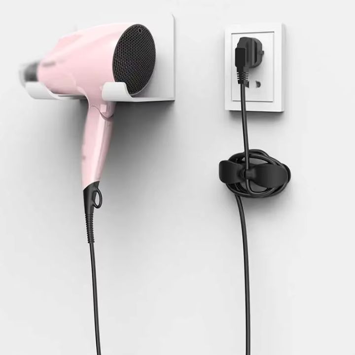 Enkel, diskret kabelholder i hvid. Selvklæbende design for smart opbevaring af kabler. Rodfrit resultat.